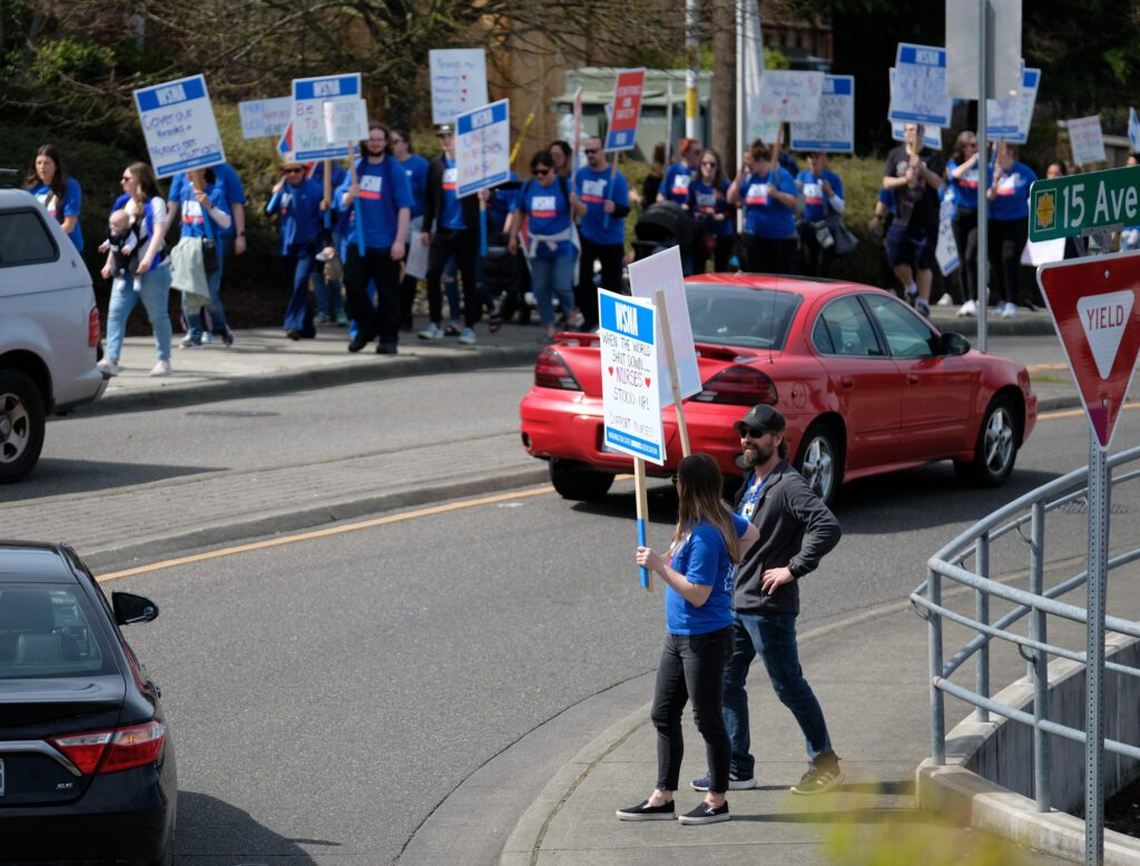 branded t-shirts for union picket for WNSA, shown worn on the picket line